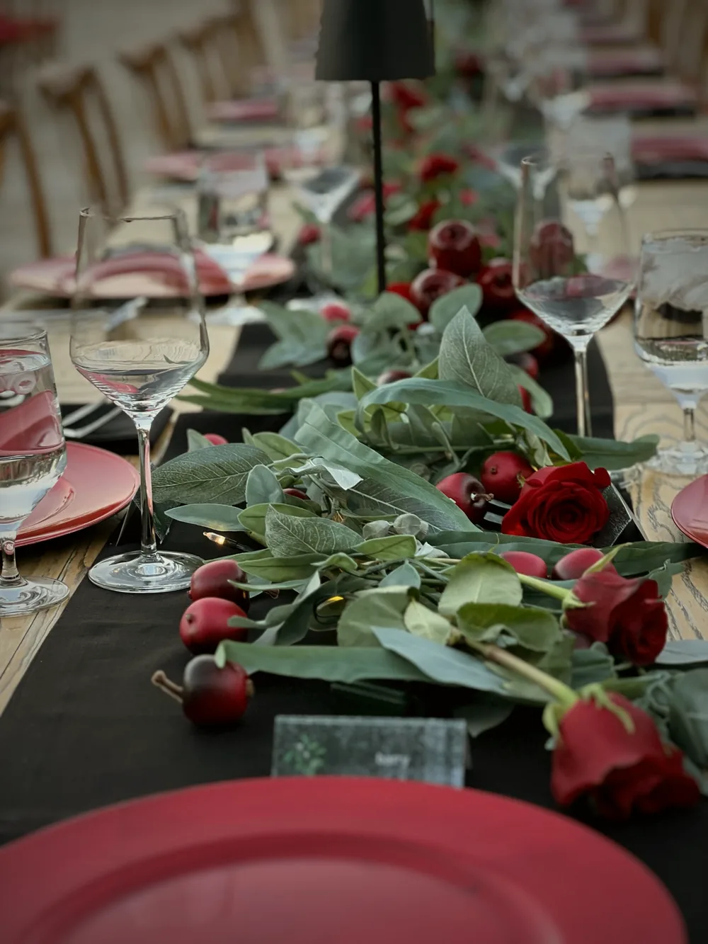 Candlelit banquet table set for a private dinner